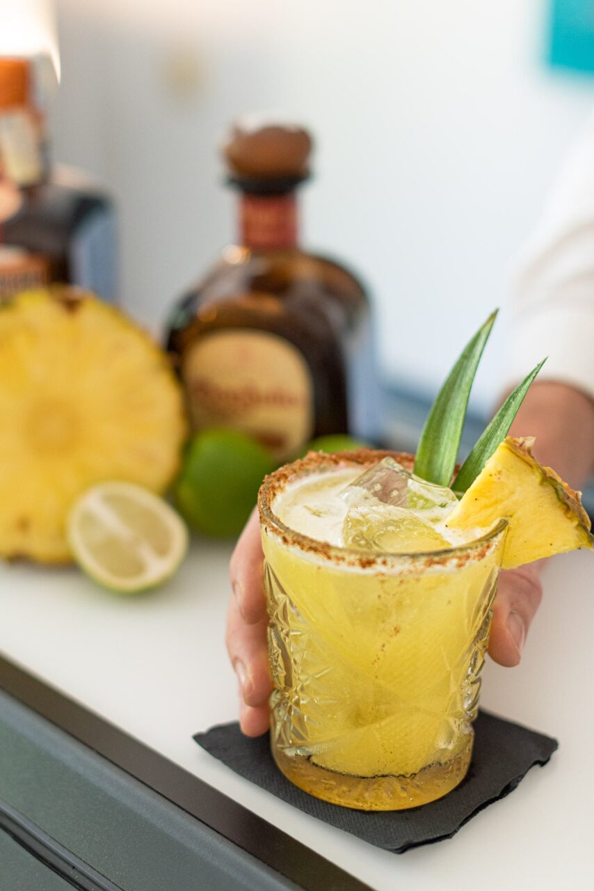 pineapple cocktail beng served during a mobile bar package service